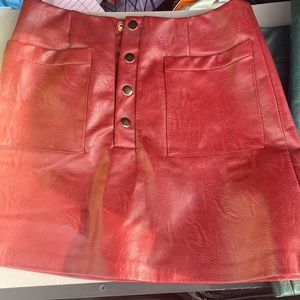 Never worn faux leather mini skirt